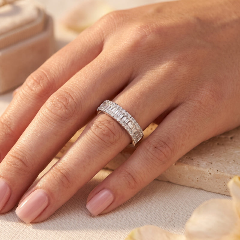 Women's S925 sterling silver baguette cubic zirconia promise ring worn on a model's hand.