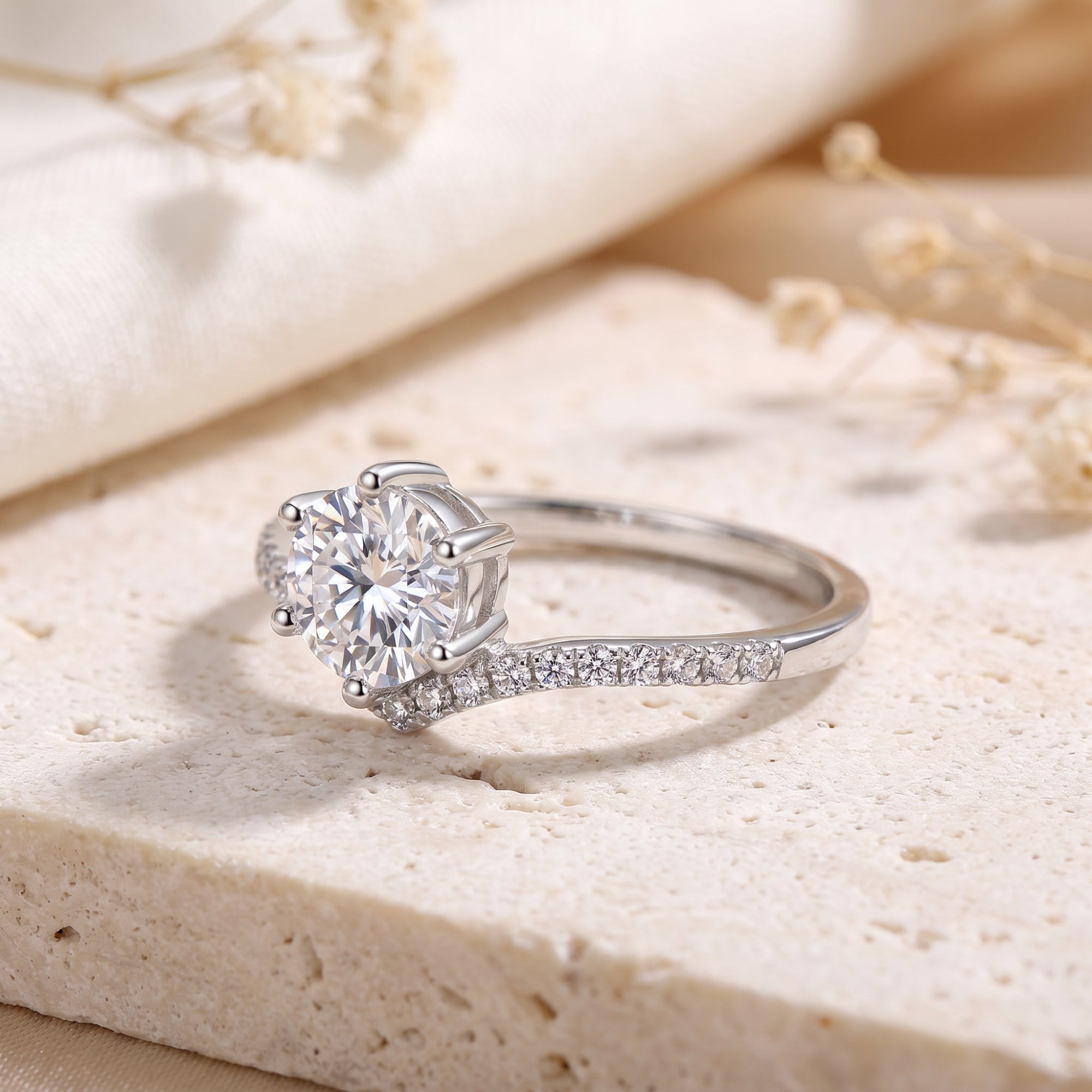 Side view of S925 silver chevron ring with round cubic zirconia.