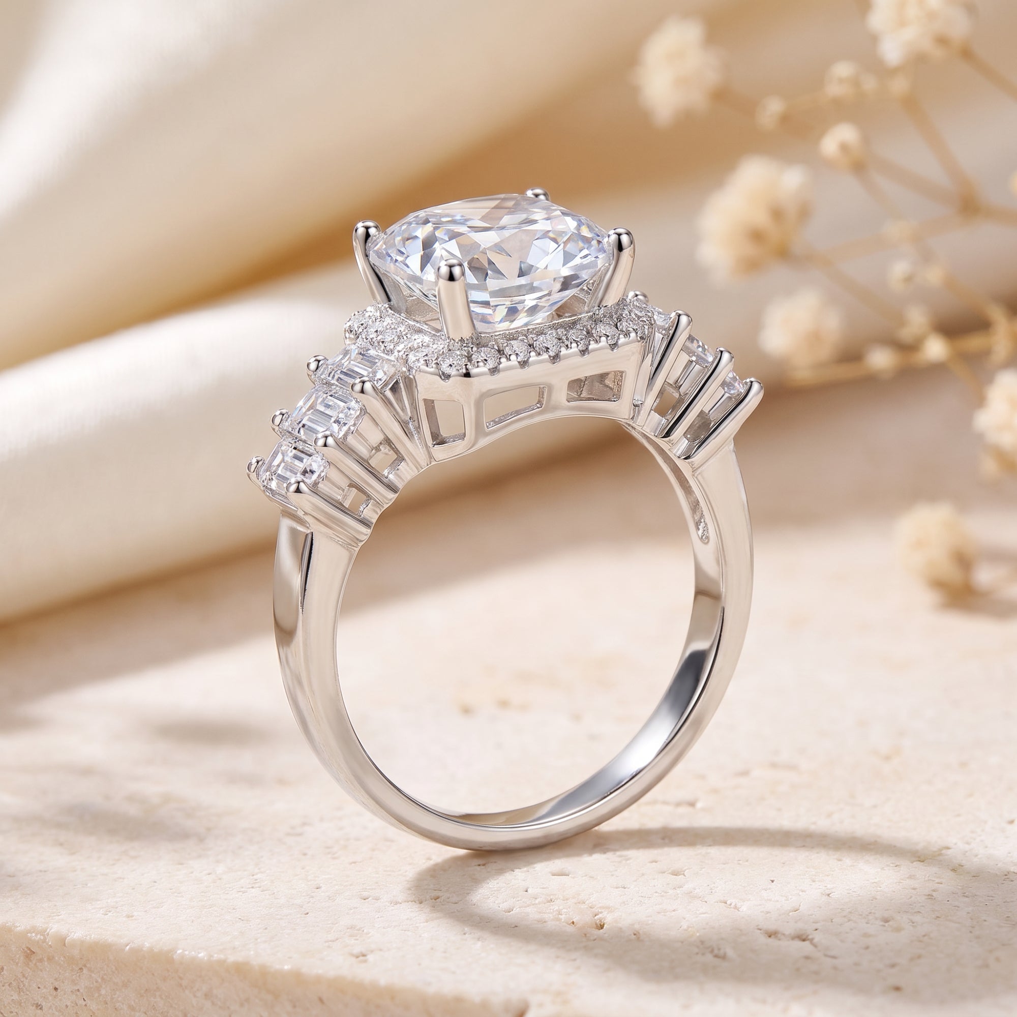 Profile view of a sterling silver cushion-cut halo ring showing the elevated setting.