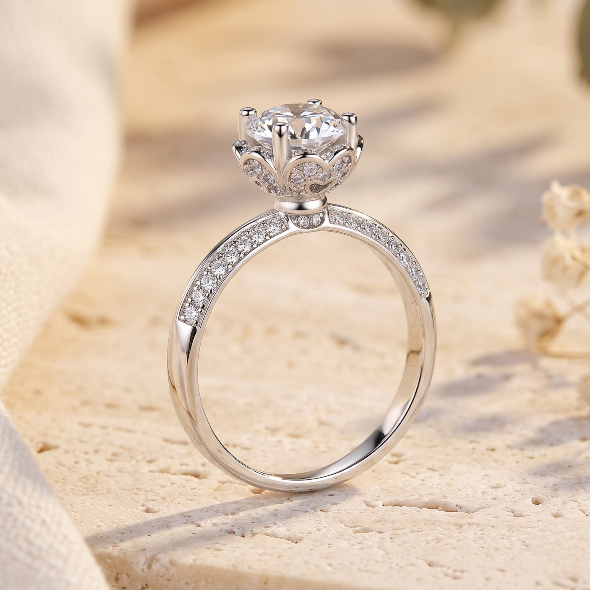 Side profile of silver Fleur Bloom ring showing flower-crown basket setting.