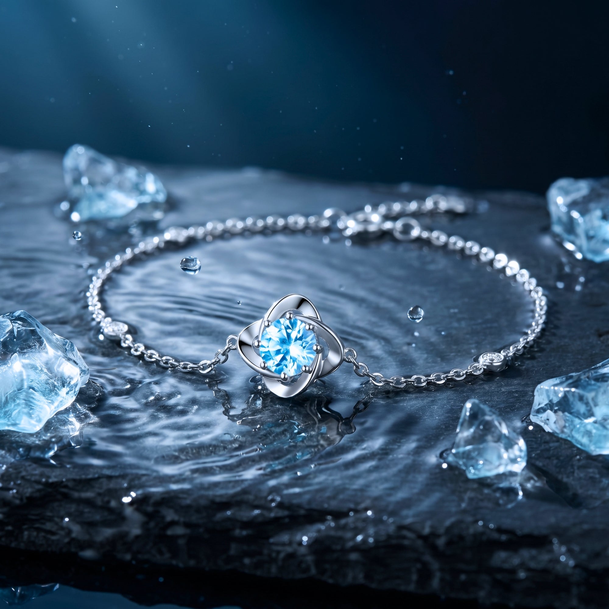 Angled view of the platinum chain bracelet with a round cut aquamarine centerpiece on a wet stone background.
