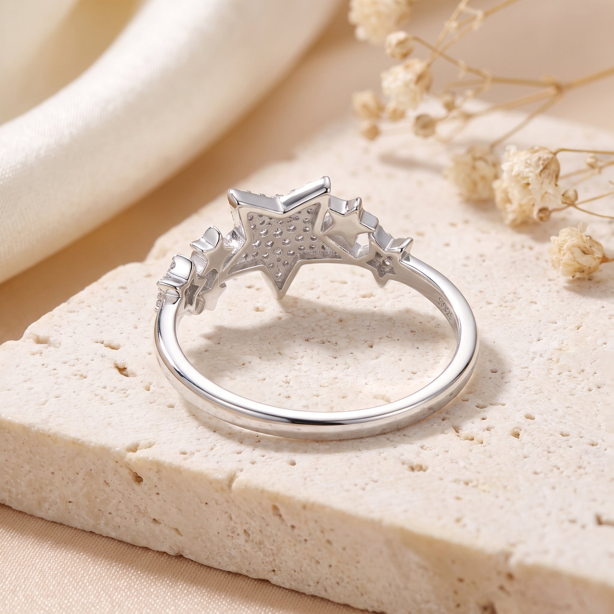Rear view of the S925 sterling silver Celestia star ring showing the hallmark and polished band.