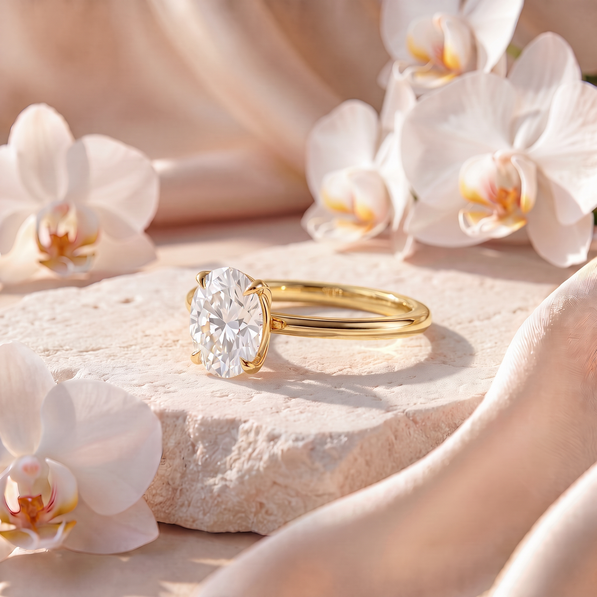 Side view profile of a yellow gold oval moissanite solitaire ring resting on a stone display.