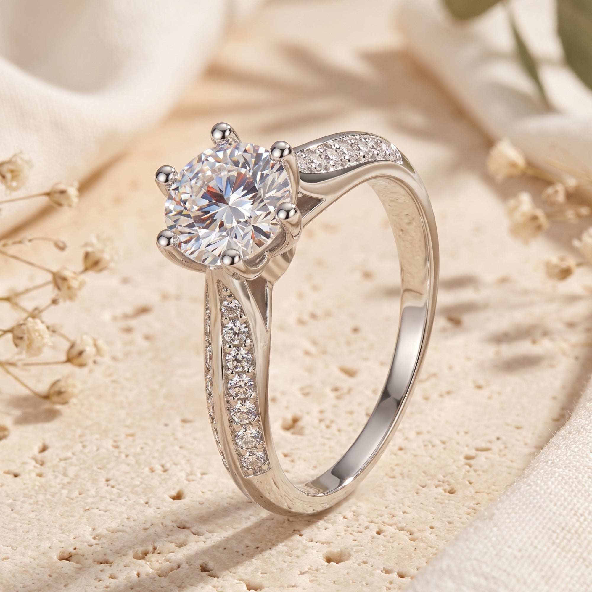Side view of Aria S925 sterling silver ring with round-cut stone and pave split-shank.