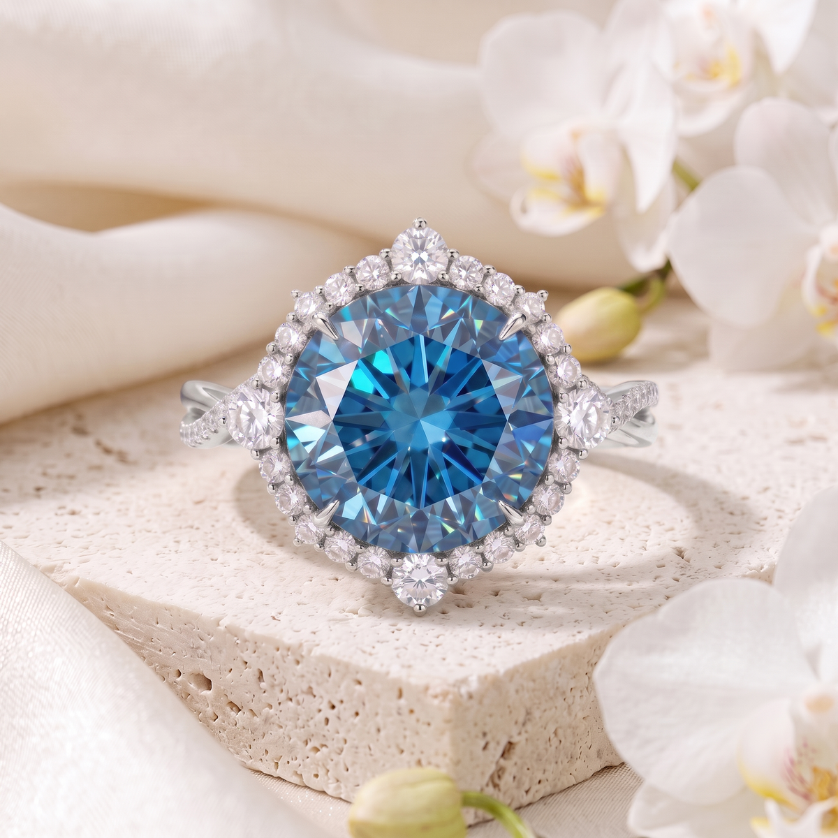 Front view of the white gold variant of the blue moissanite halo ring.