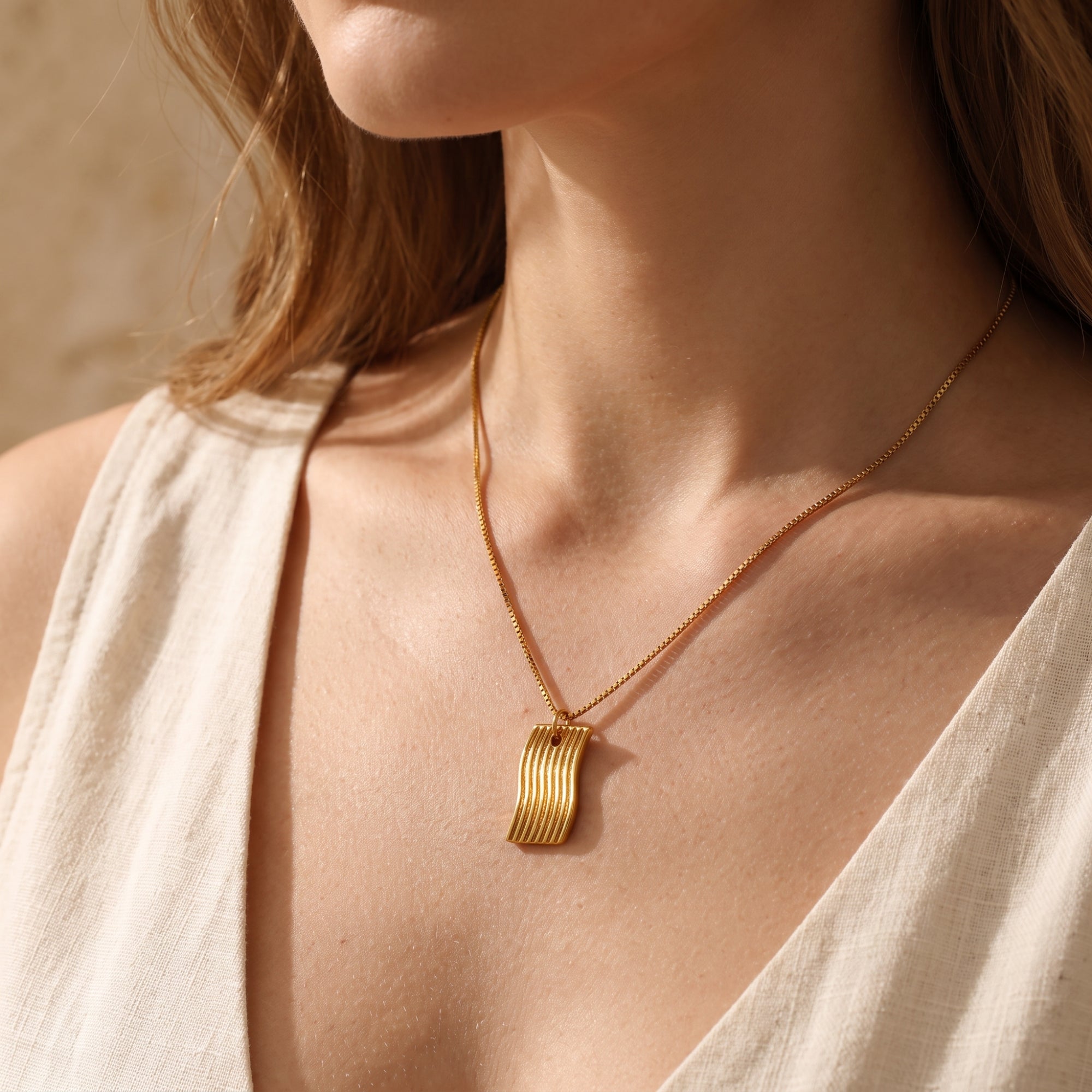 The Fluid Wave Pendant Necklace