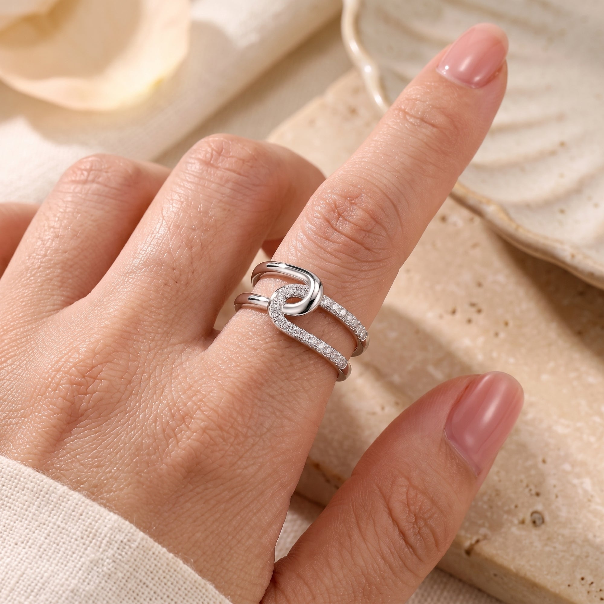 The Entwined Knot Ring