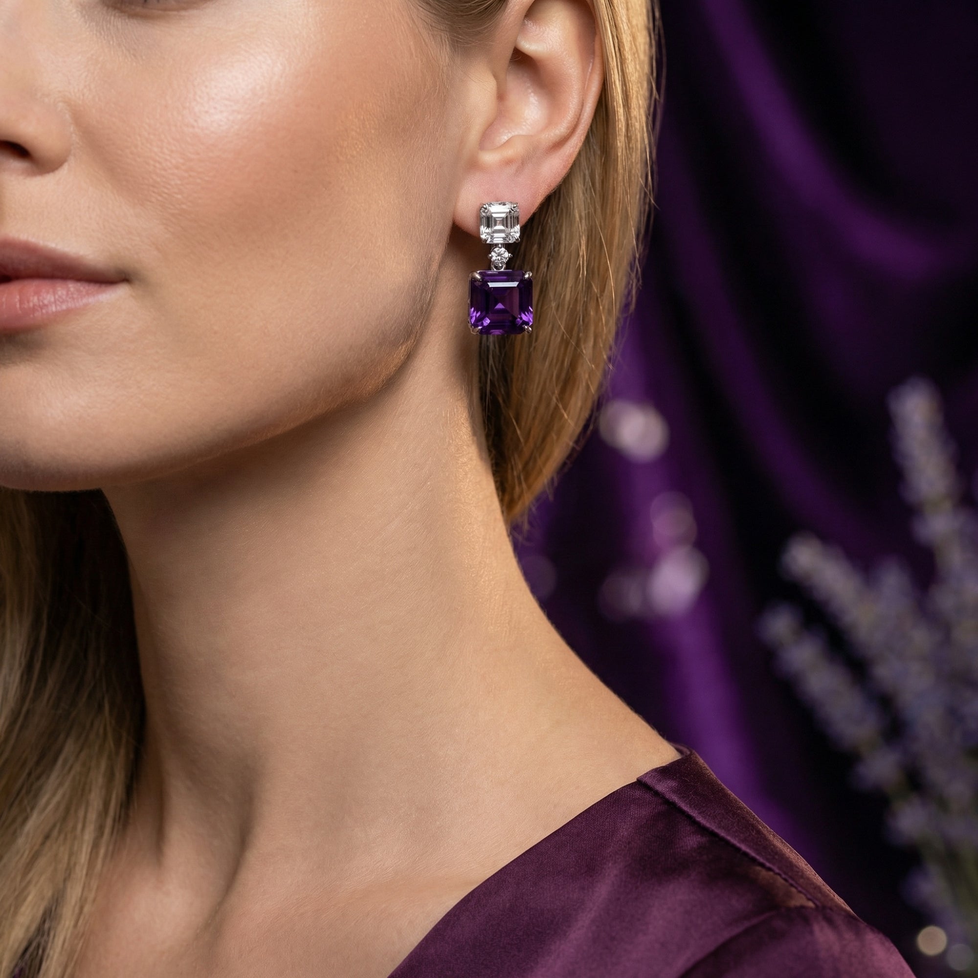Side view of a model wearing the Viorra square cut amethyst drop earrings in sterling silver.