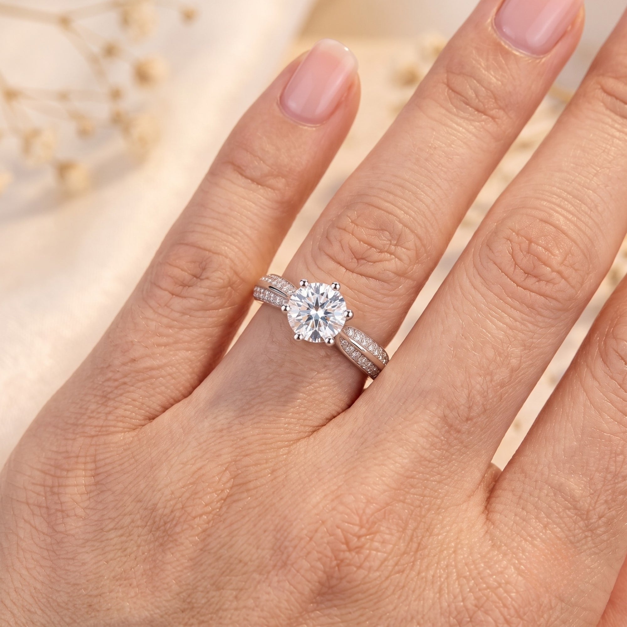 Aria simulated diamond ring in S925 sterling silver with split-shank on model's finger.