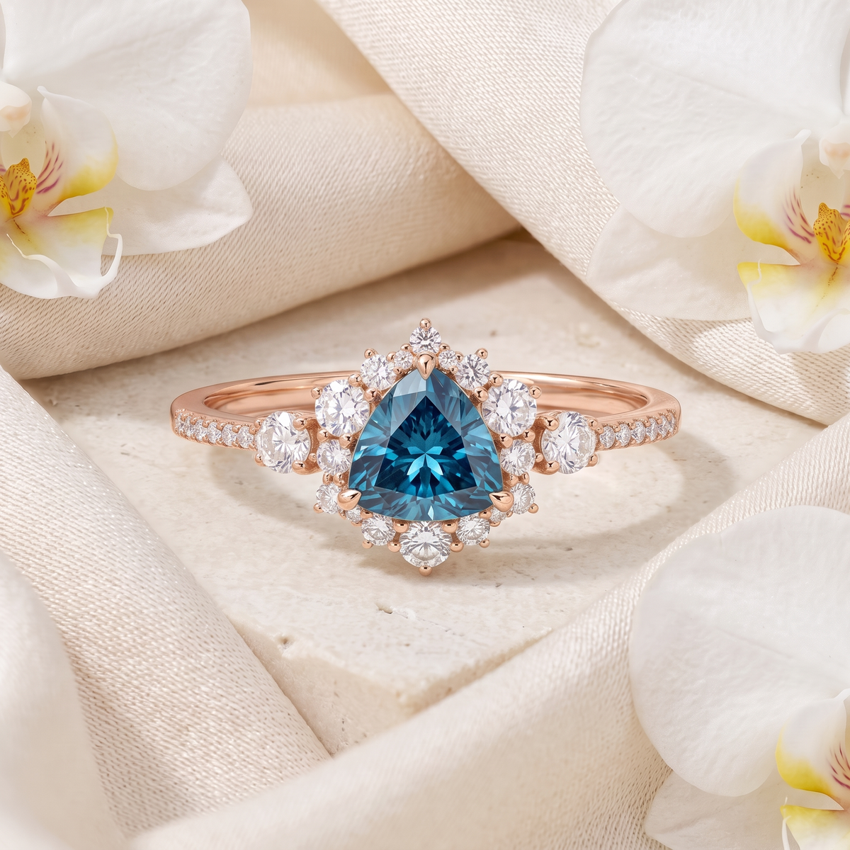 Rose gold halo engagement ring with a striking trillion-cut blue moissanite center stone.