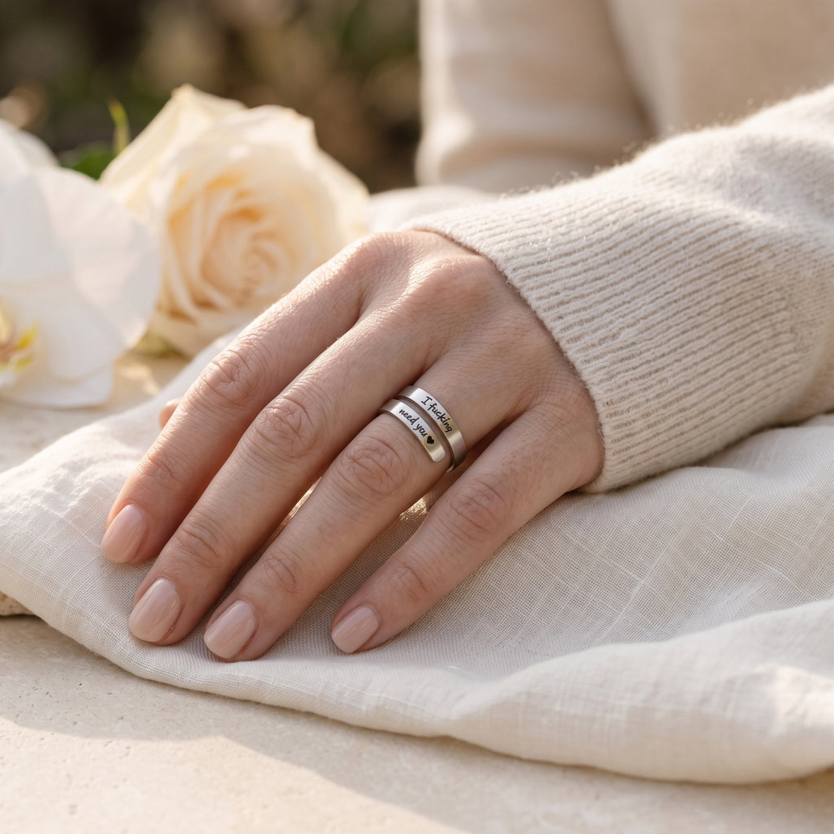 Silver I Need You open wrap ring worn on a hand