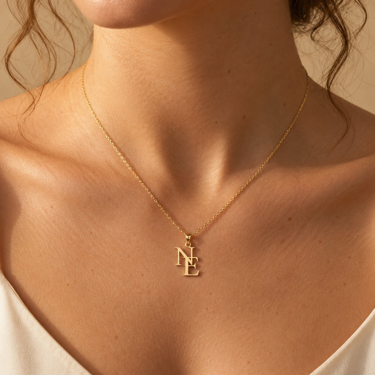 The Intertwined Initial Necklace
