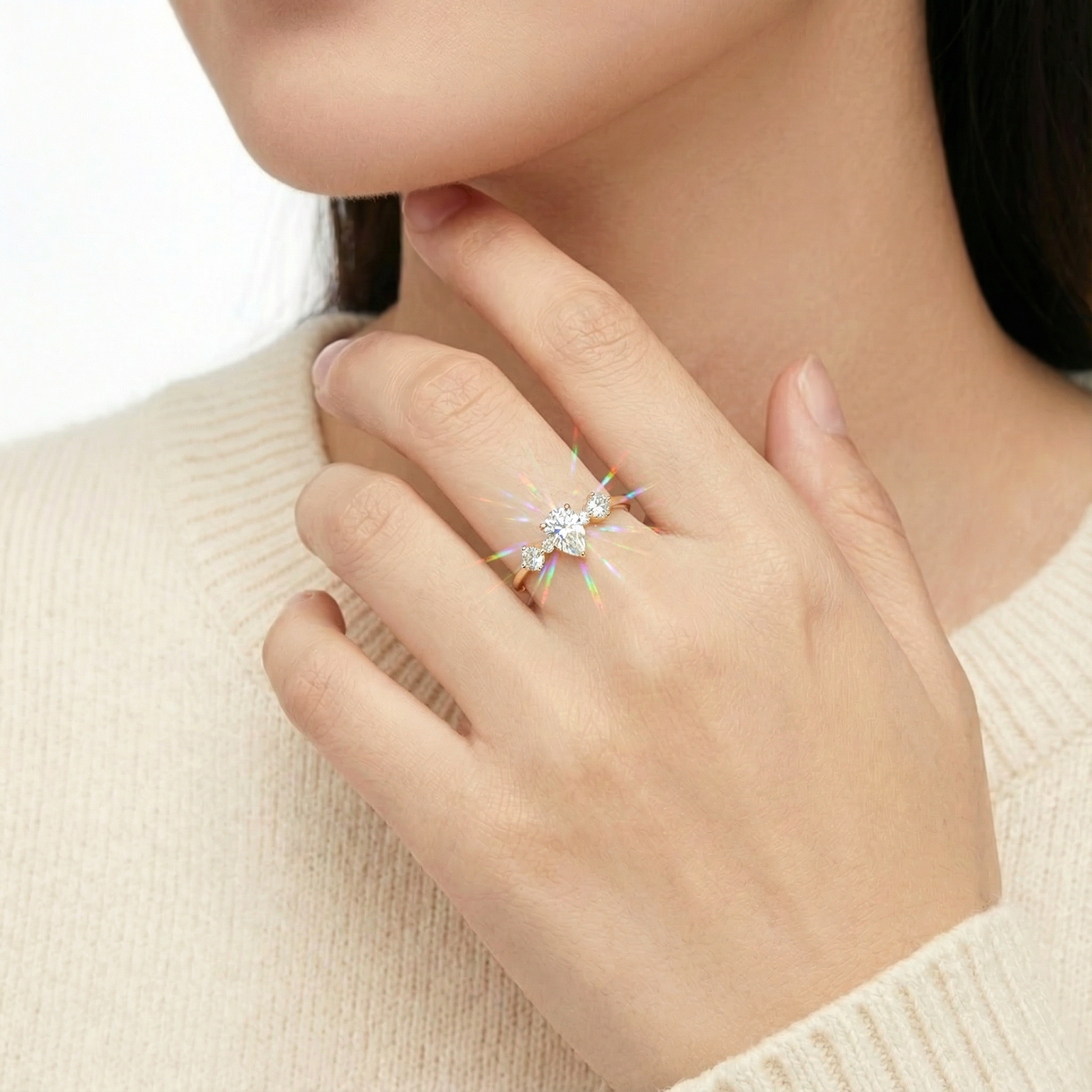 Model wearing the 18K gold vermeil moissanite ring on her finger, highlighting its brilliant fire and sparkle.