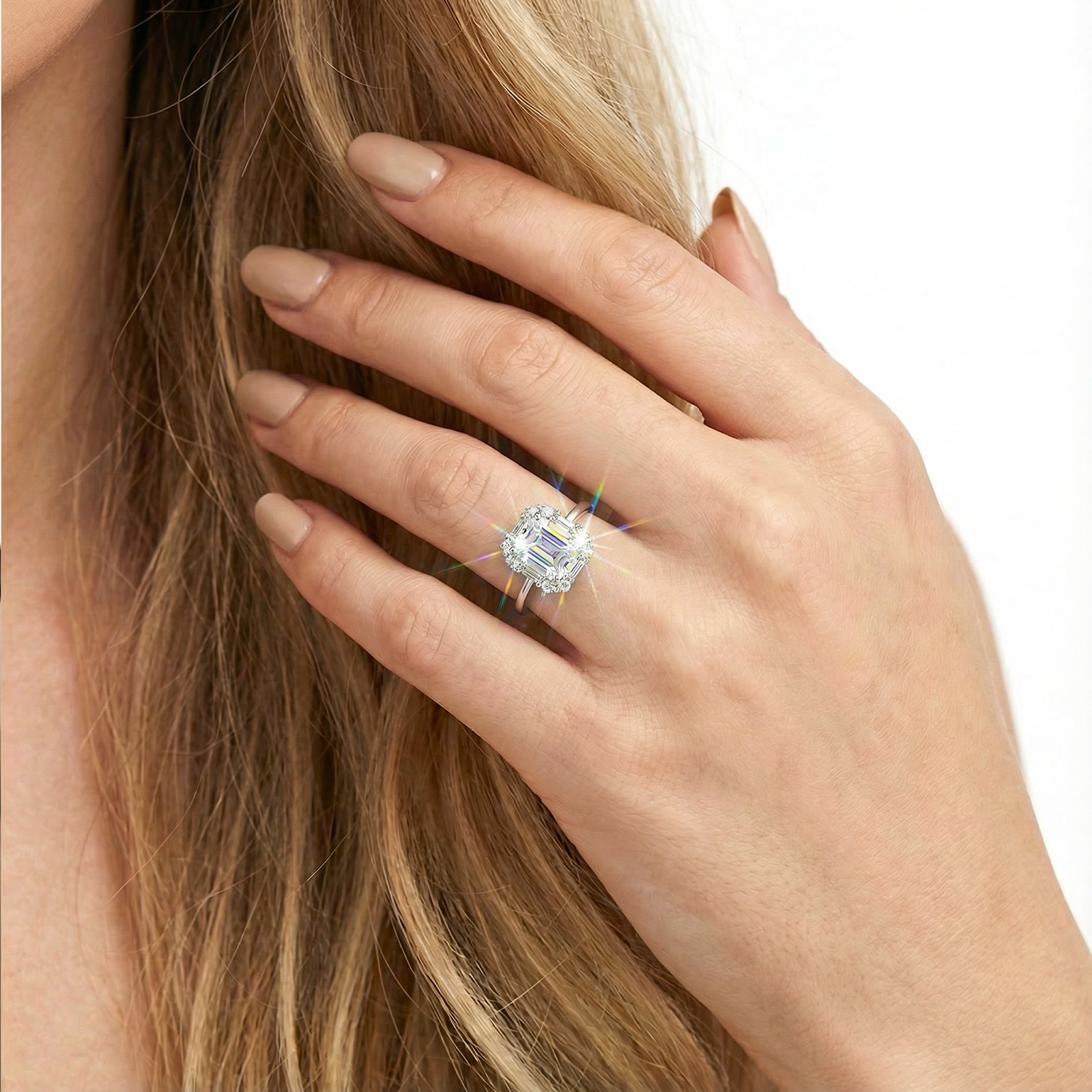 Close-up of the S925 sterling silver halo ring with a sparkling octagon-cut zirconia worn on a model's hand.