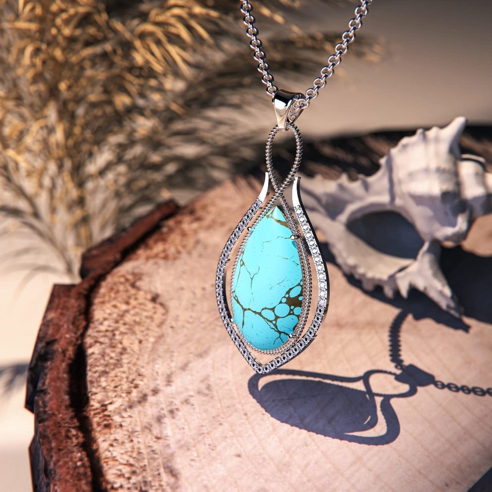 Mermaid's Turquoise Pendant Necklace featuring a turquoise stone set in S925 sterling silver middle zoomed view of pendant in high detail