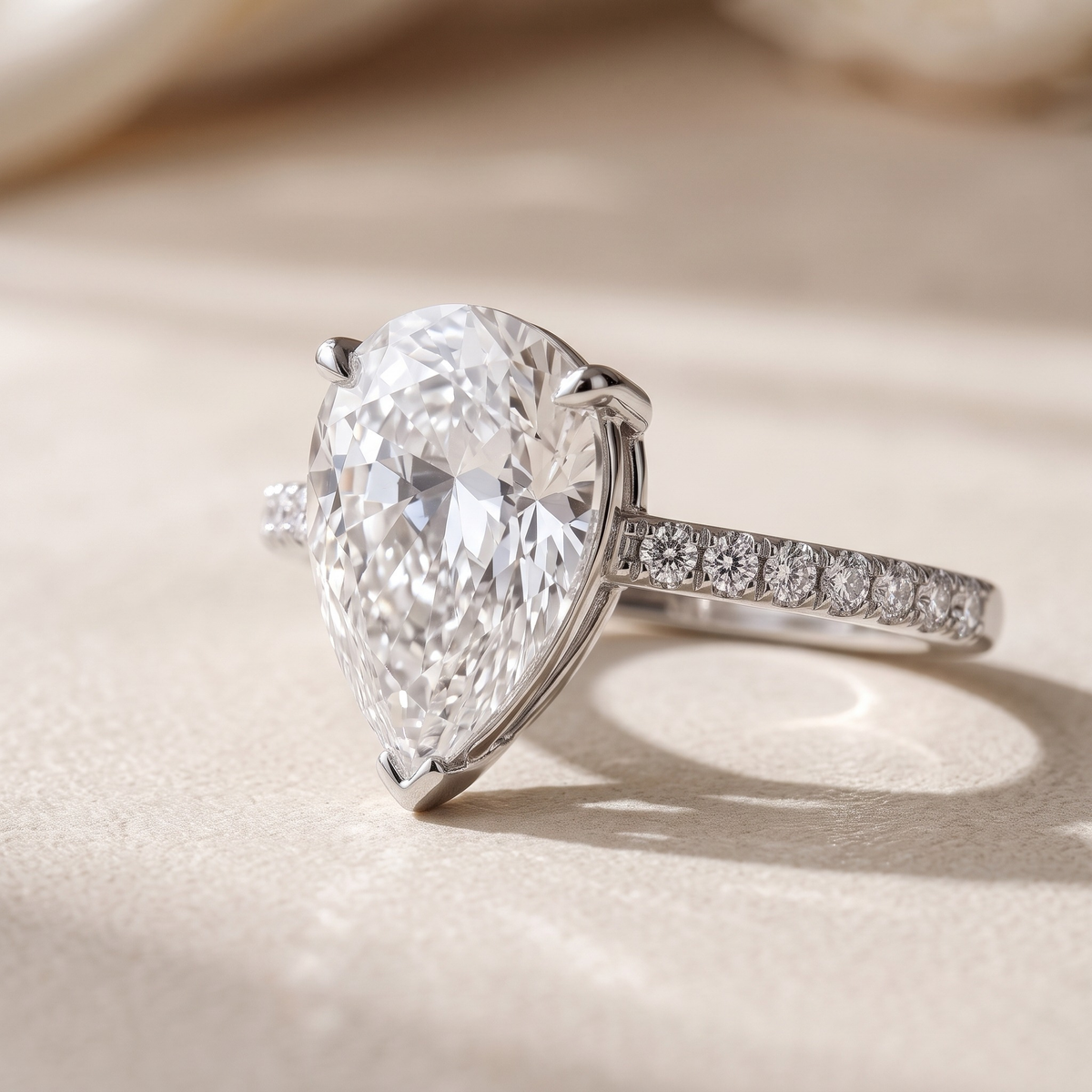 2CT Pear Cut Moissanite Eternity Ring — Silver 45-degree macro closeup