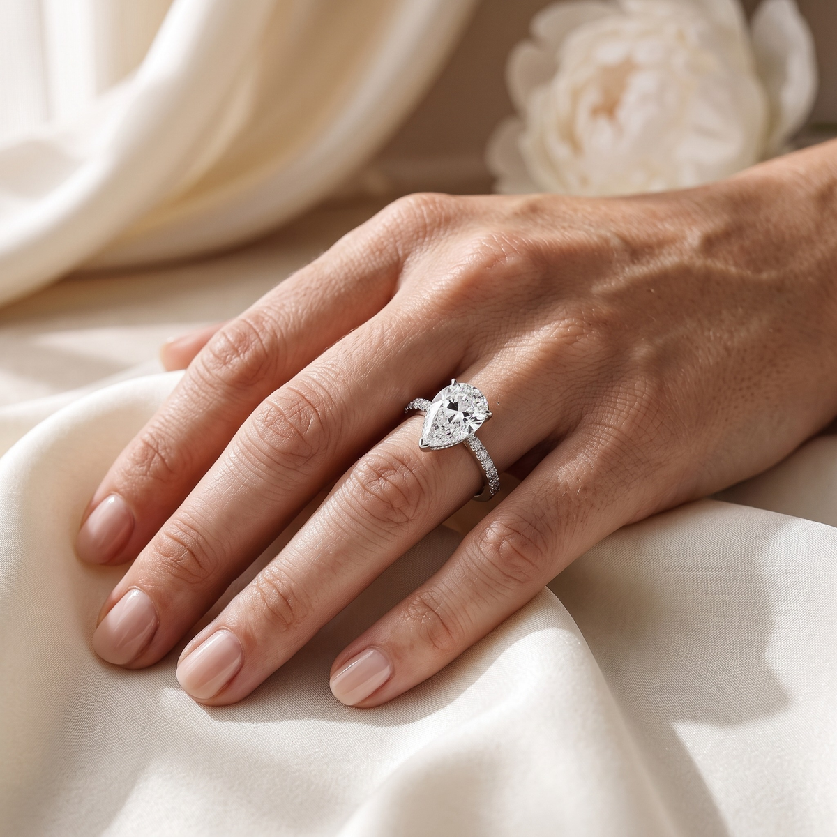 2CT Pear Cut Moissanite Eternity Ring — Silver model closeup