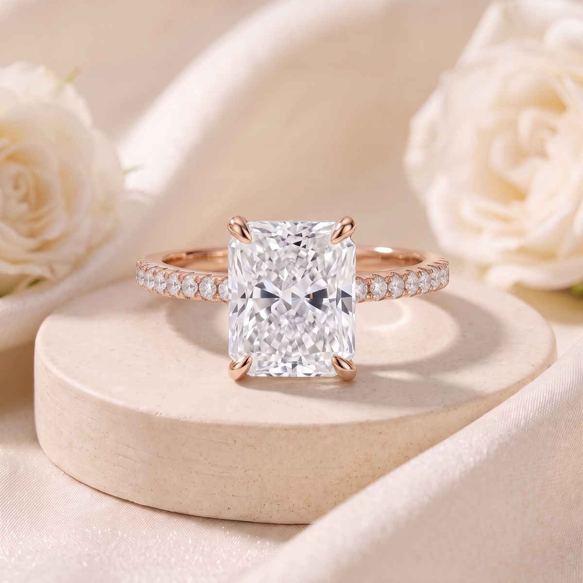 Radiant-cut moissanite ring in rose gold, front product view.