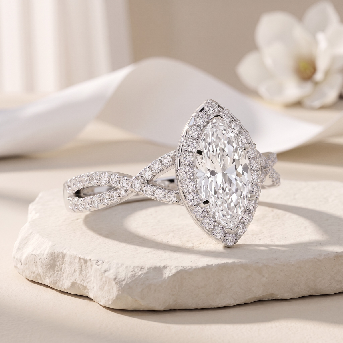 Marquise halo infinity ring in silver, angled close-up