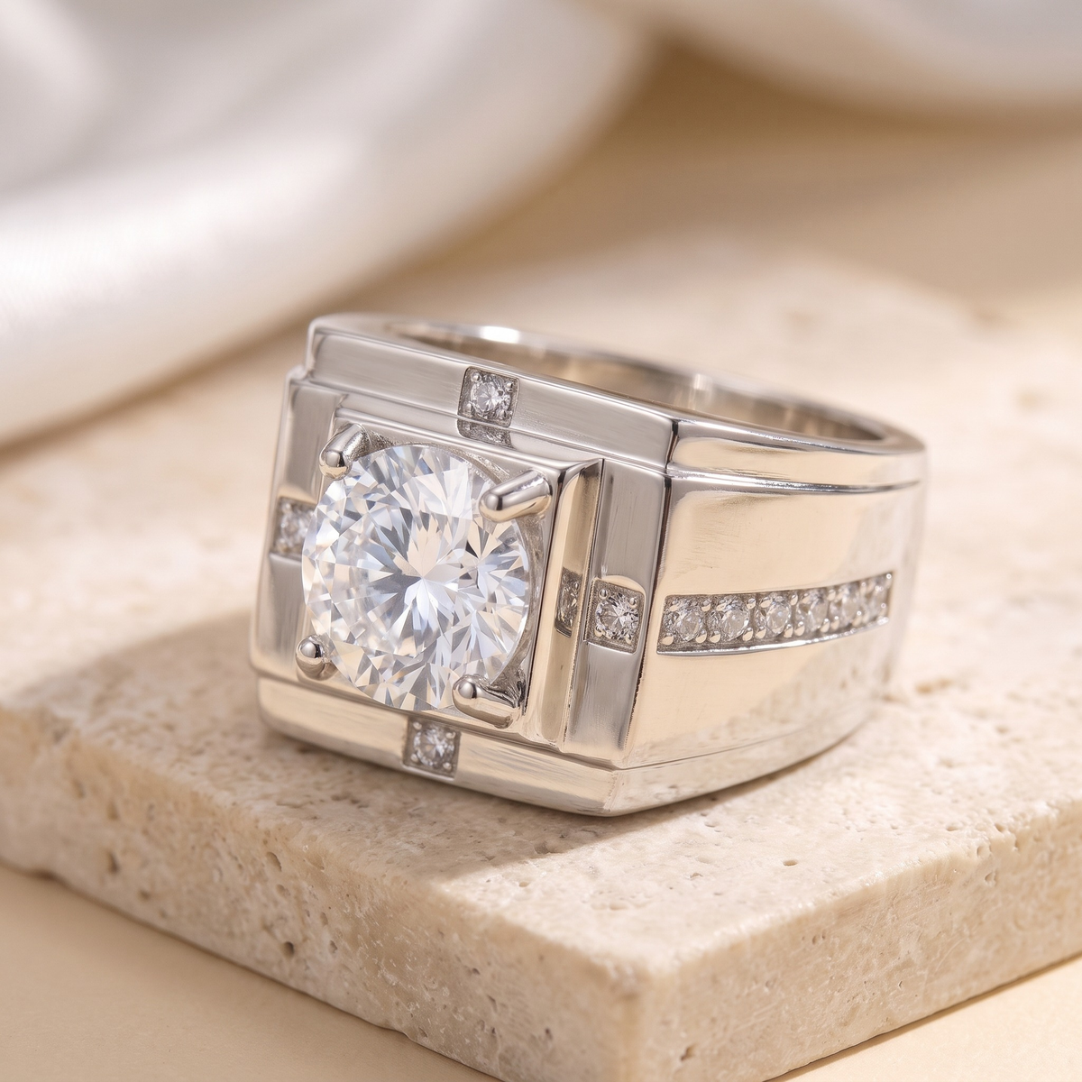 Men's bold round moissanite ring in silver, angled close-up