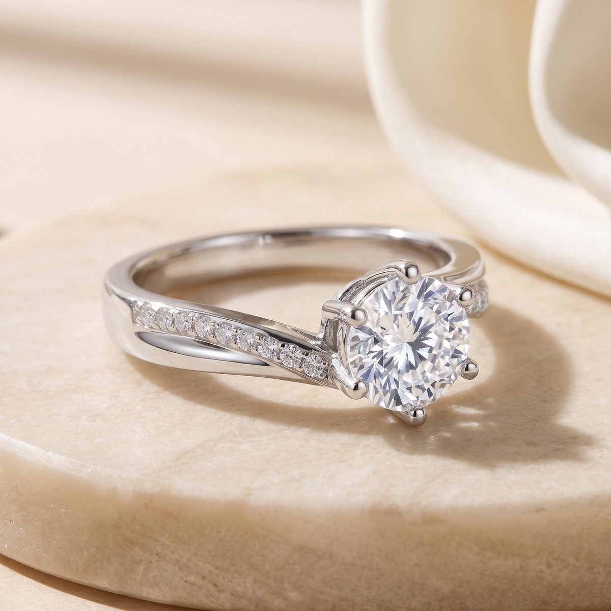 Twisting pavé round moissanite ring in silver, macro close-up