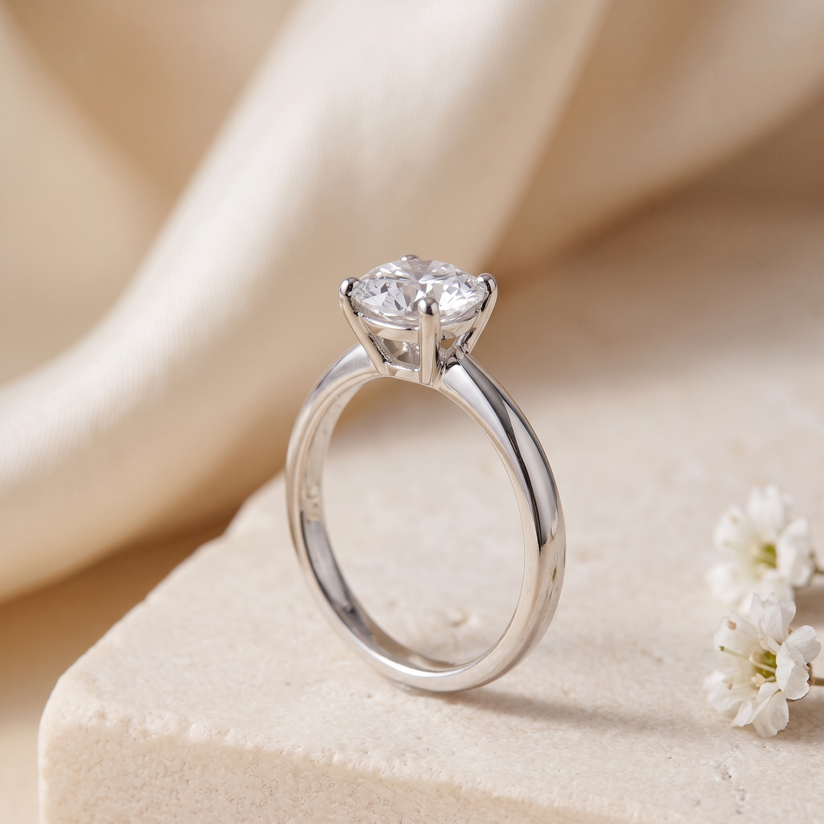1CT brilliant round moissanite solitaire in silver, macro side view