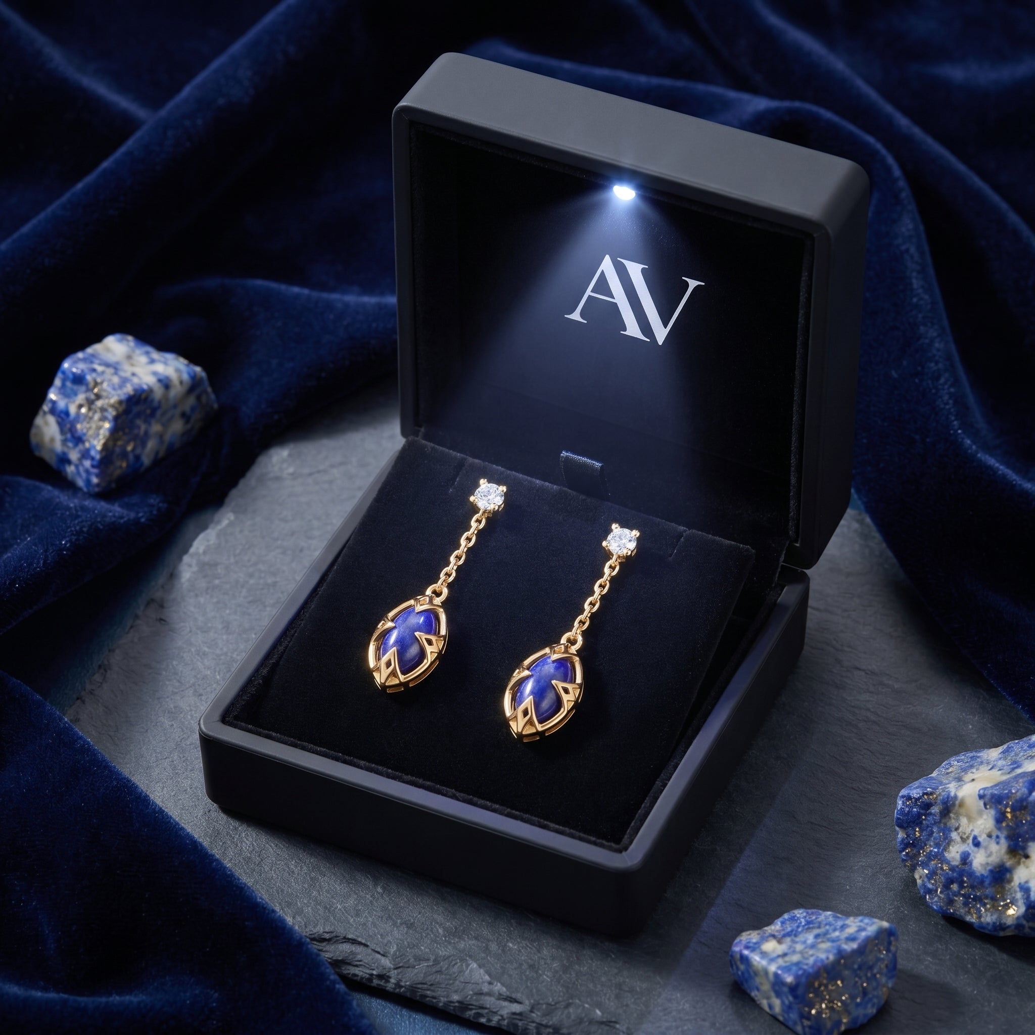 18k gold plated marquise lapis lazuli drop earrings in a luxury black LED-lit jewelry gift box.