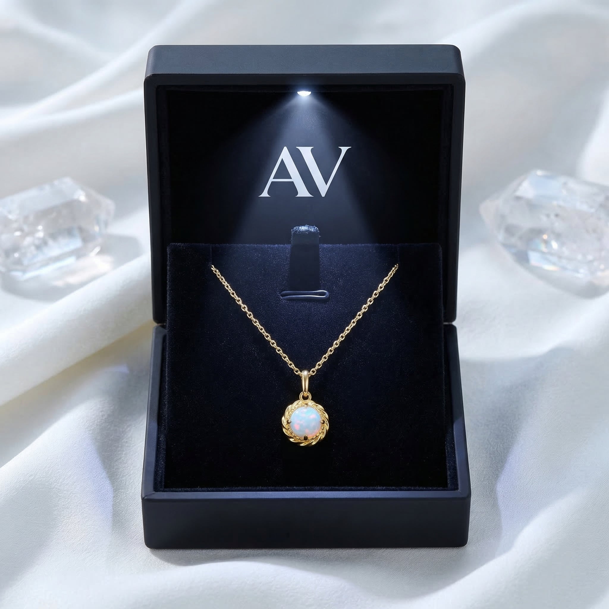 Gold-tone round opal necklace displayed in a black premium LED-lit jewelry gift box.