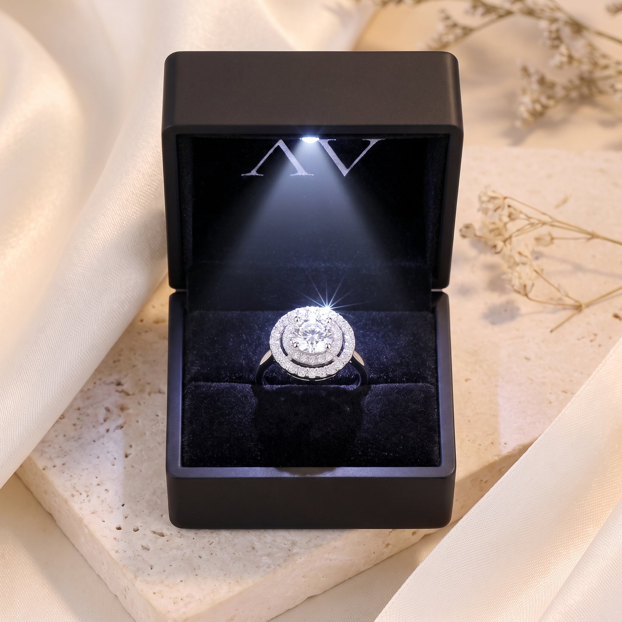 S925 sterling silver double halo solitaire ring presented in a black LED-lit jewelry gift box.