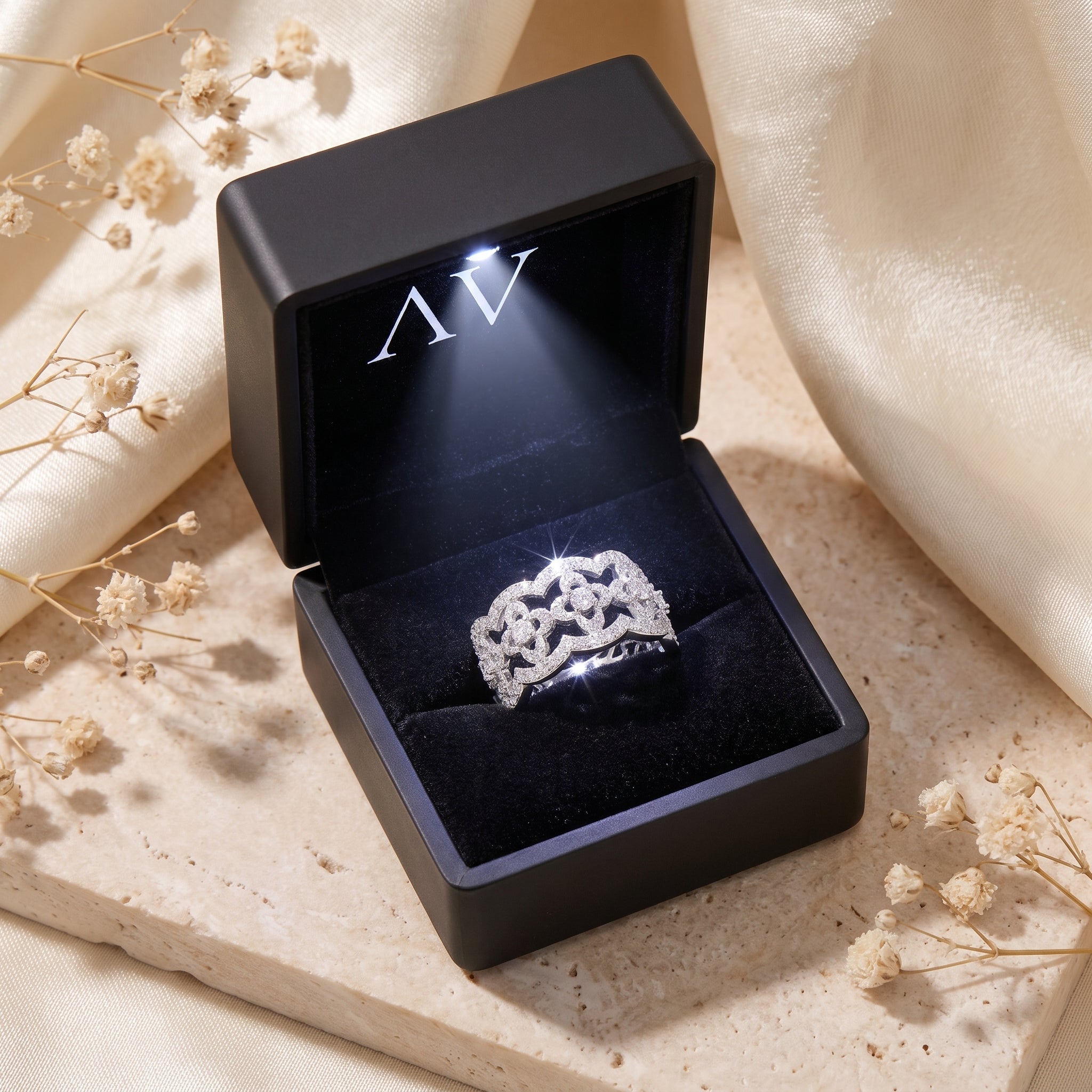 S925 sterling silver clover lattice promise ring inside a black LED-lit jewelry gift box.
