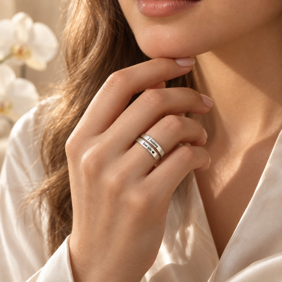 Silver engraved open wrap ring worn on a hand
