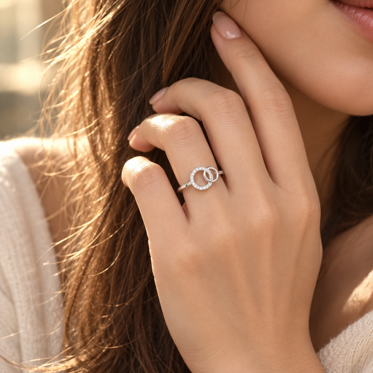 Silver Always Us interlocking circle ring worn on a hand