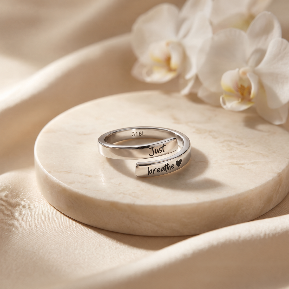 Just Breathe open silver ring — approved 316L stamp correction, source page 2