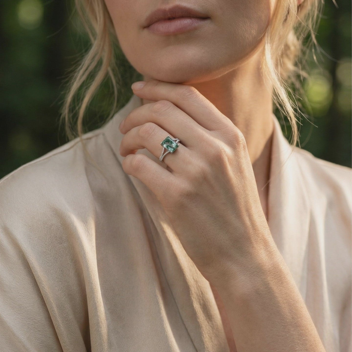 A solid gold ring with a natural moss agate gemstone and moissanite accents.