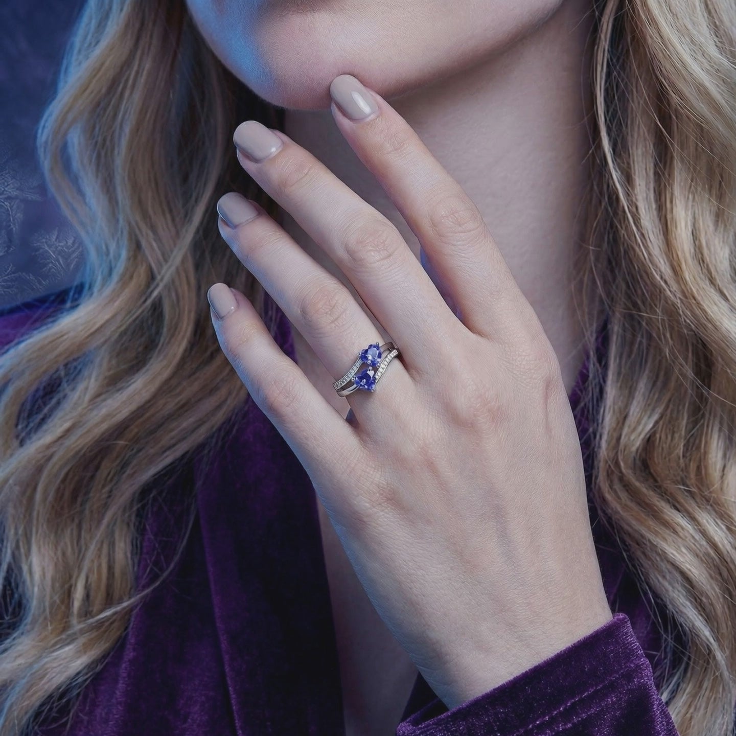 A solid gold ring with simulated tanzanite.