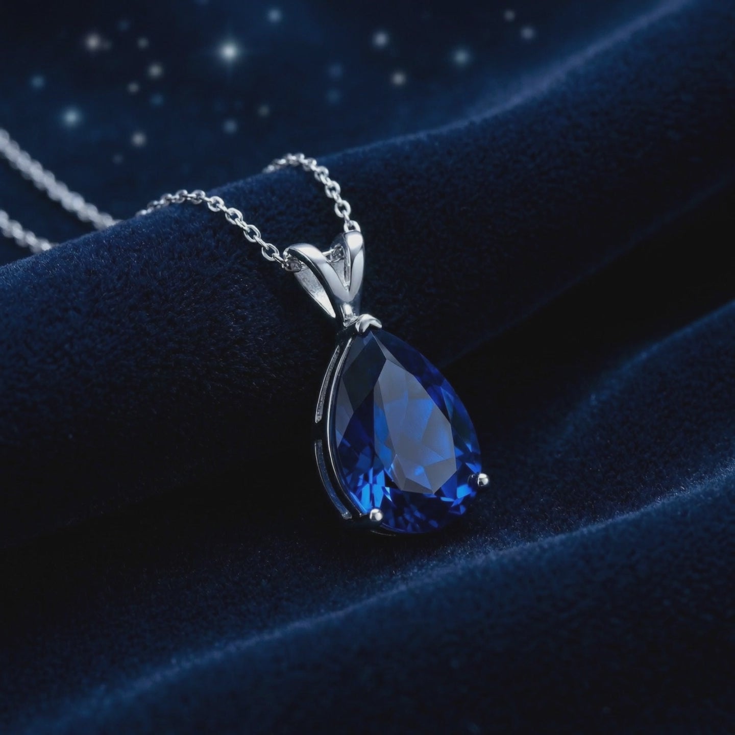 Sapphire Blue Moissanite pendant necklace in solid gold.