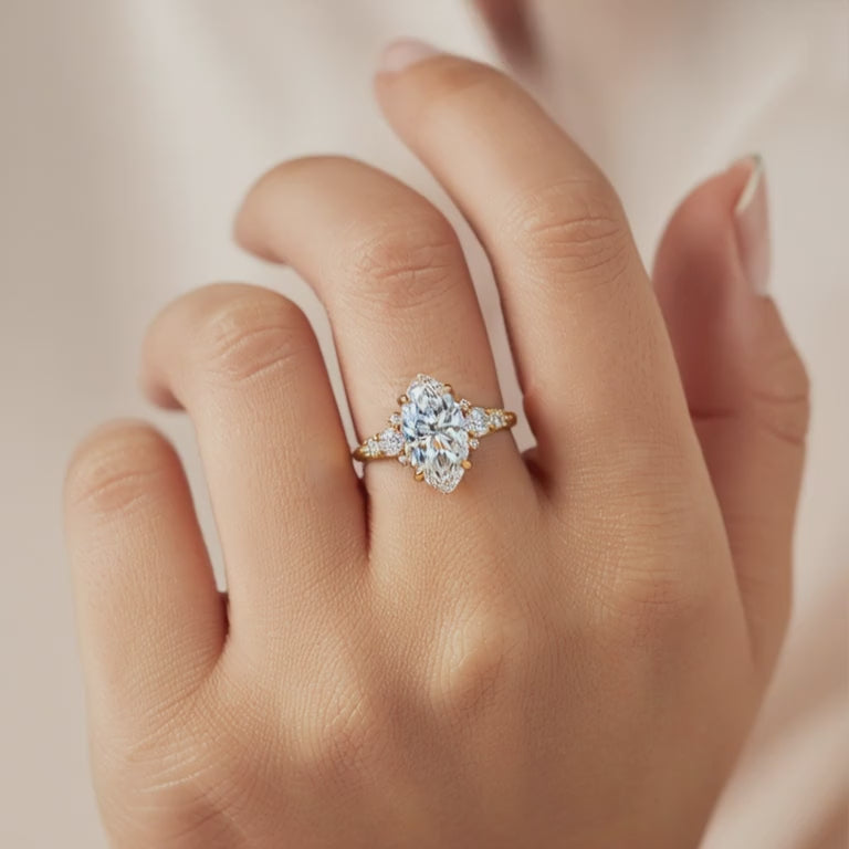 The Bella Jewel Marquise Cut Moissanite Ring in solid gold.