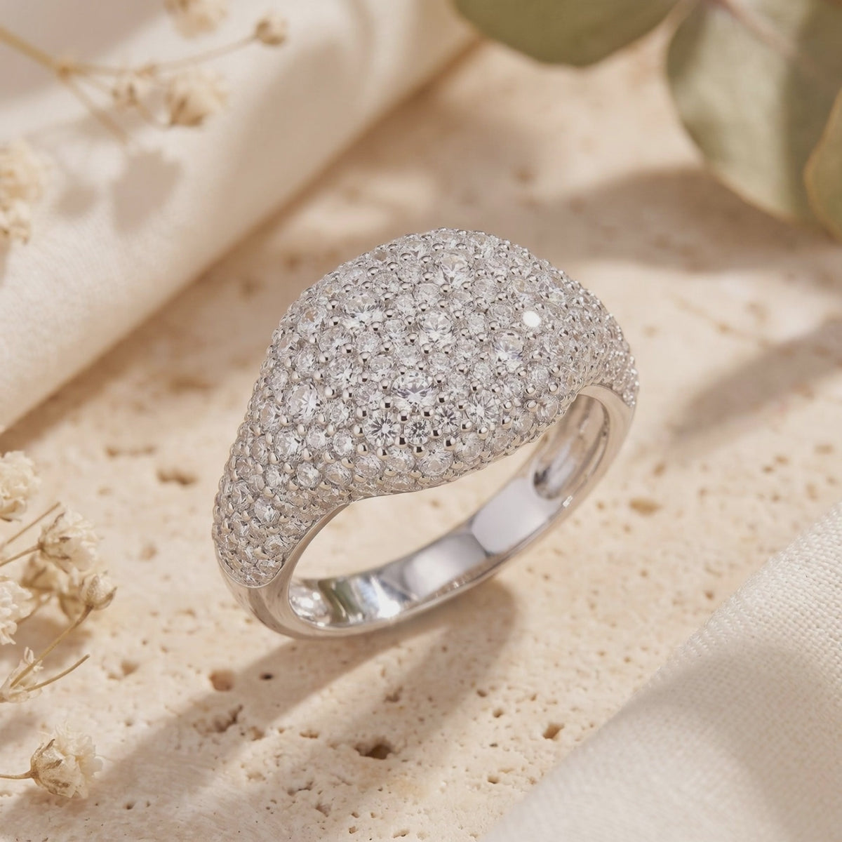 14K and 18K solid gold pave dome ring in white gold with simulated diamonds.