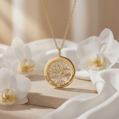 Solid gold necklace with Tree of Life pendant.