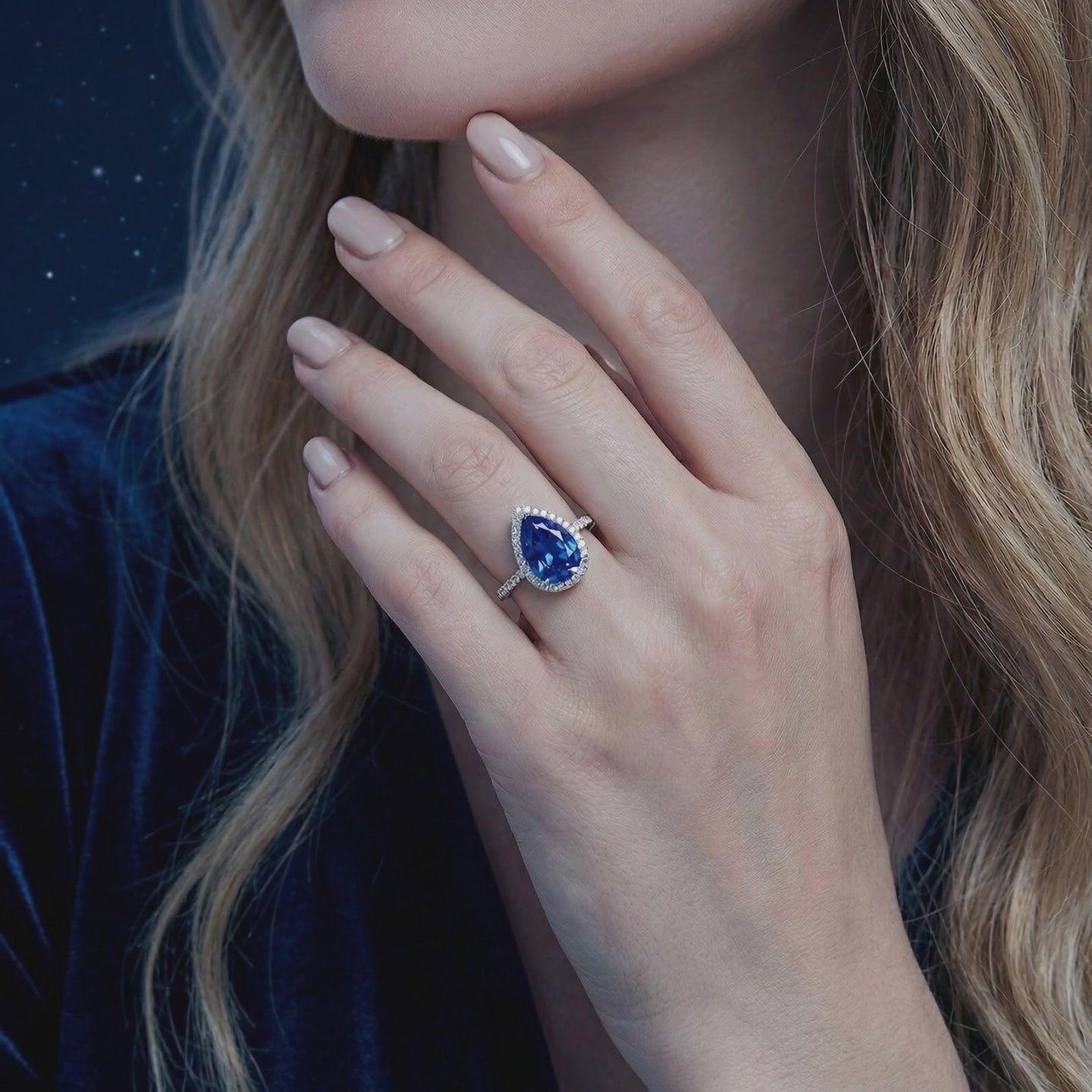 Simulated sapphire halo ring in solid gold.