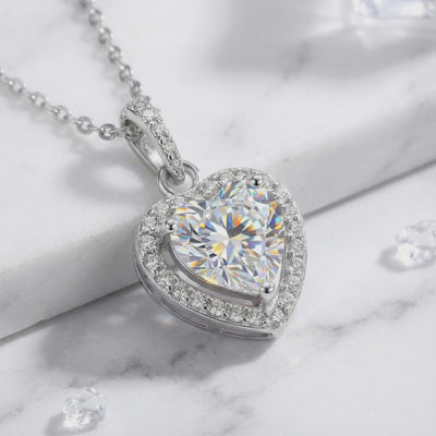 Heart simulated diamond necklace in solid gold.
