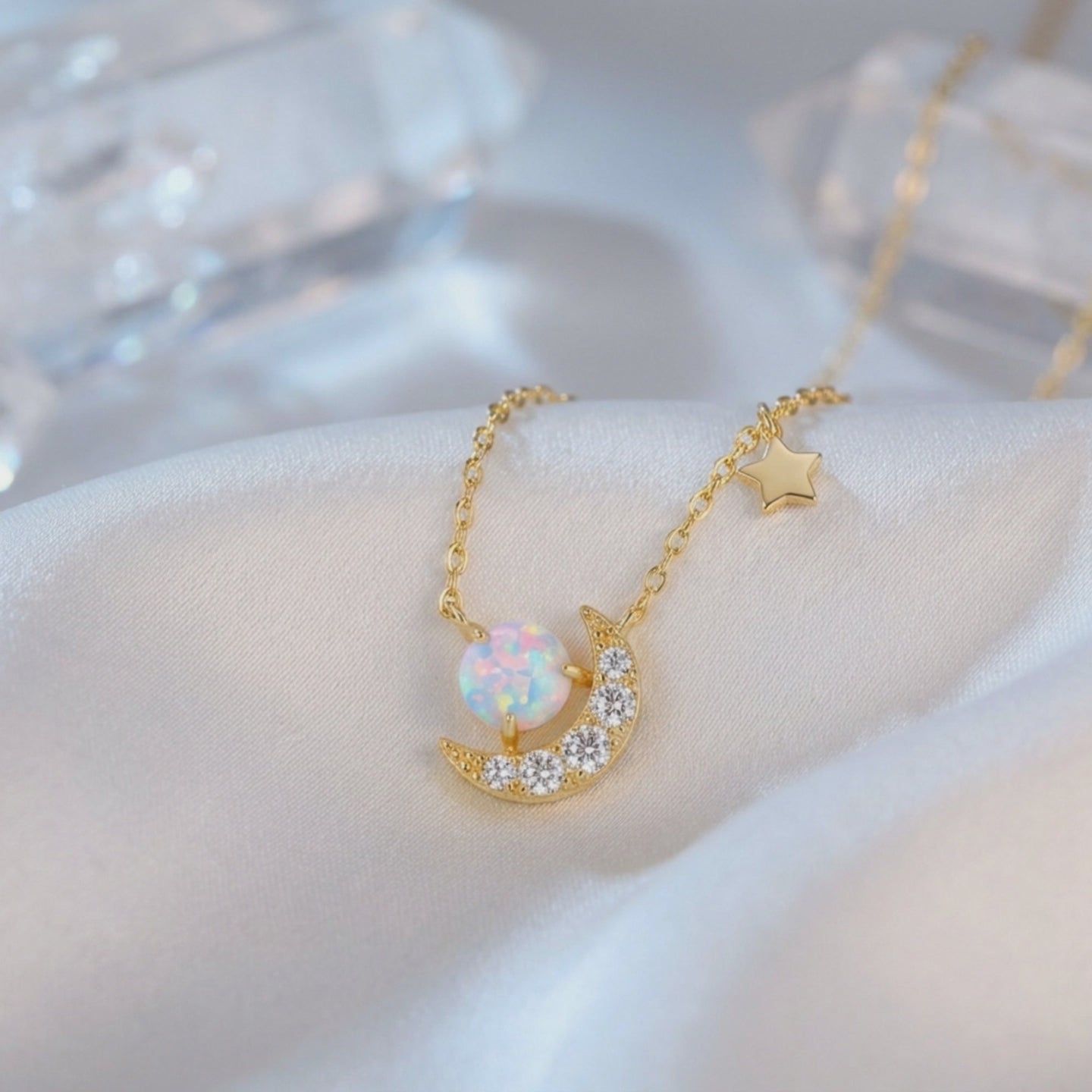 Solid gold necklace with natural opal pendant.