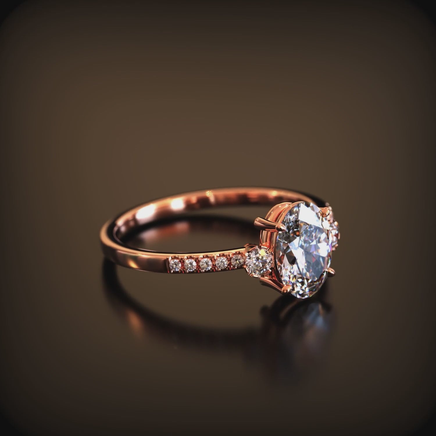 Video of a solid gold ring with an oval moissanite stone