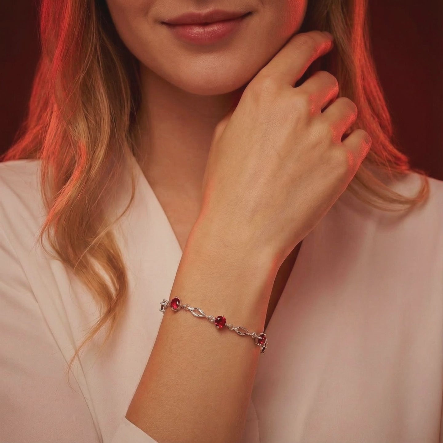 Aderyn Station Bracelet in solid gold with simulated rubies.