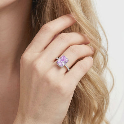 Radiant cut purple simulated amethyst ring in solid white gold showcasing the low-profile setting.