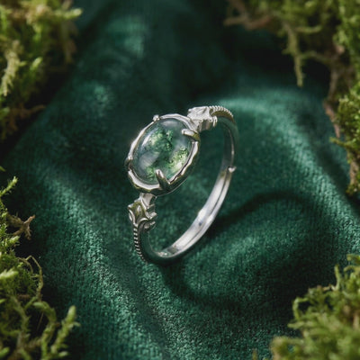 Video of an oval natural moss agate solid gold ring.