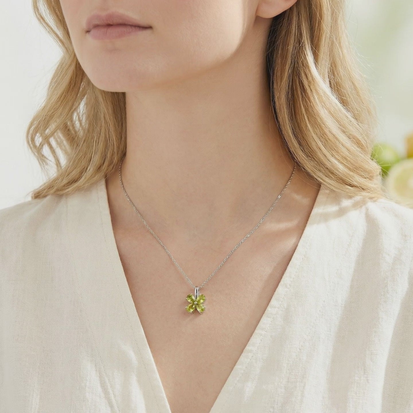 Solid gold necklace with simulated peridot stones.