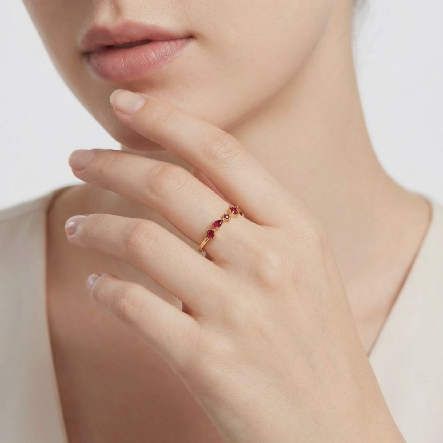 The Julianna cluster ring in solid gold with simulated rubies.
