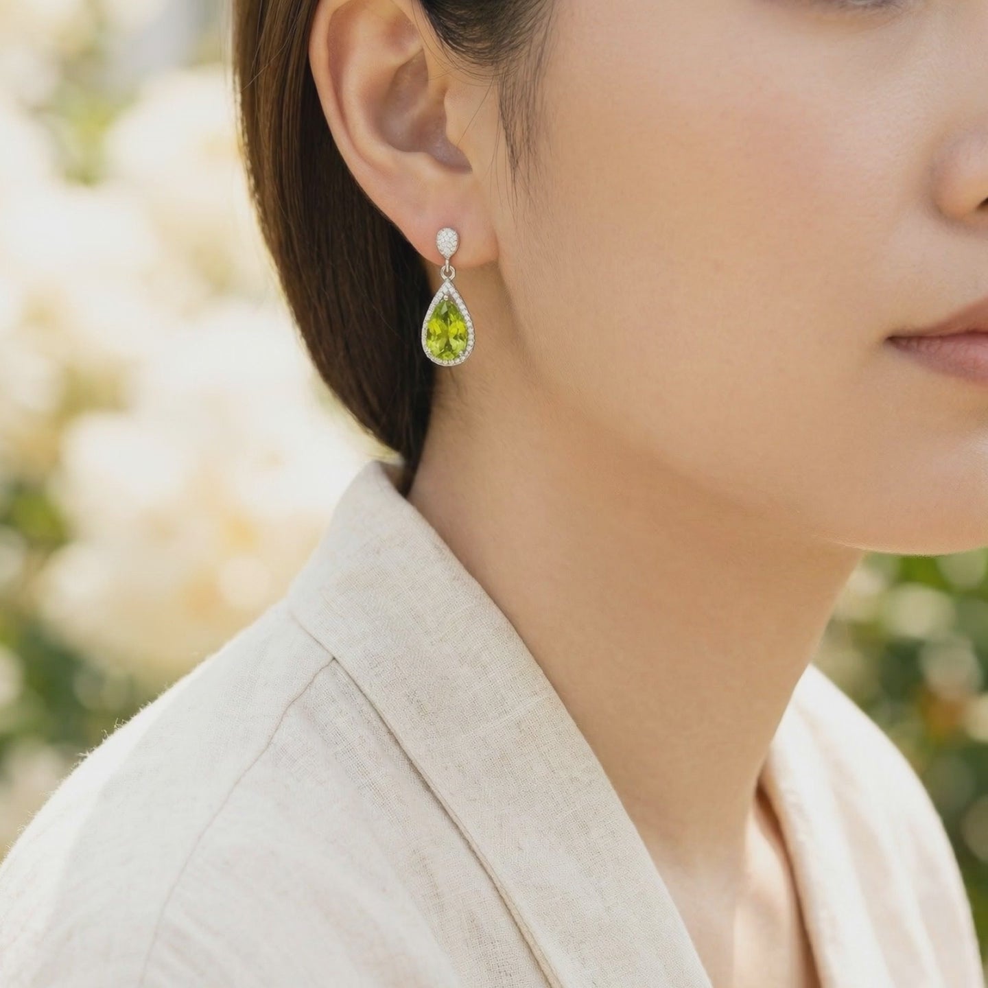 Valerelle Drop earrings with simulated peridot in solid gold.