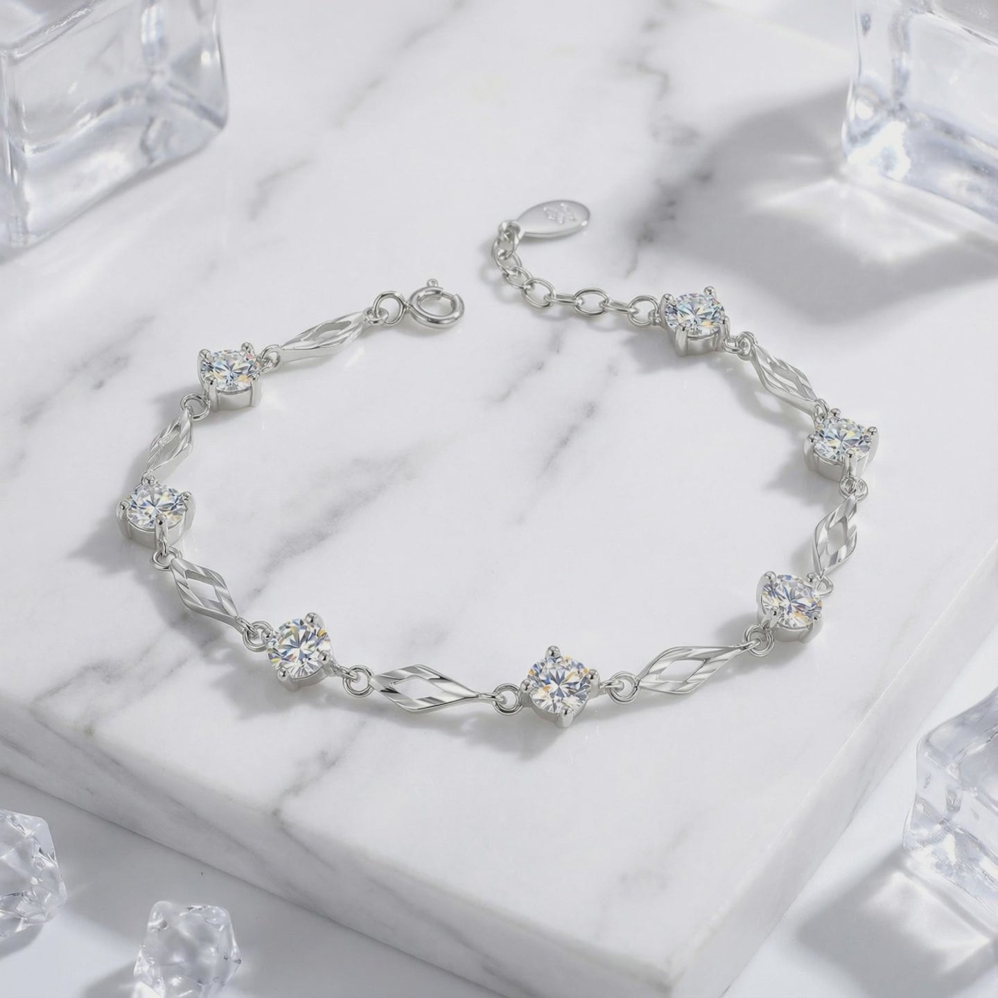A solid gold bracelet with simulated diamonds.